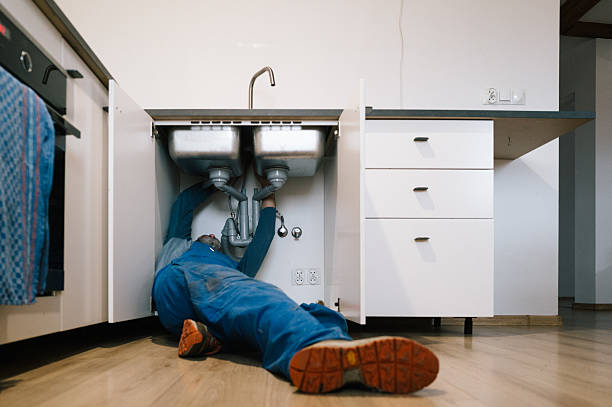 Professional Drain Cleaning technician working in Muscatine, IA